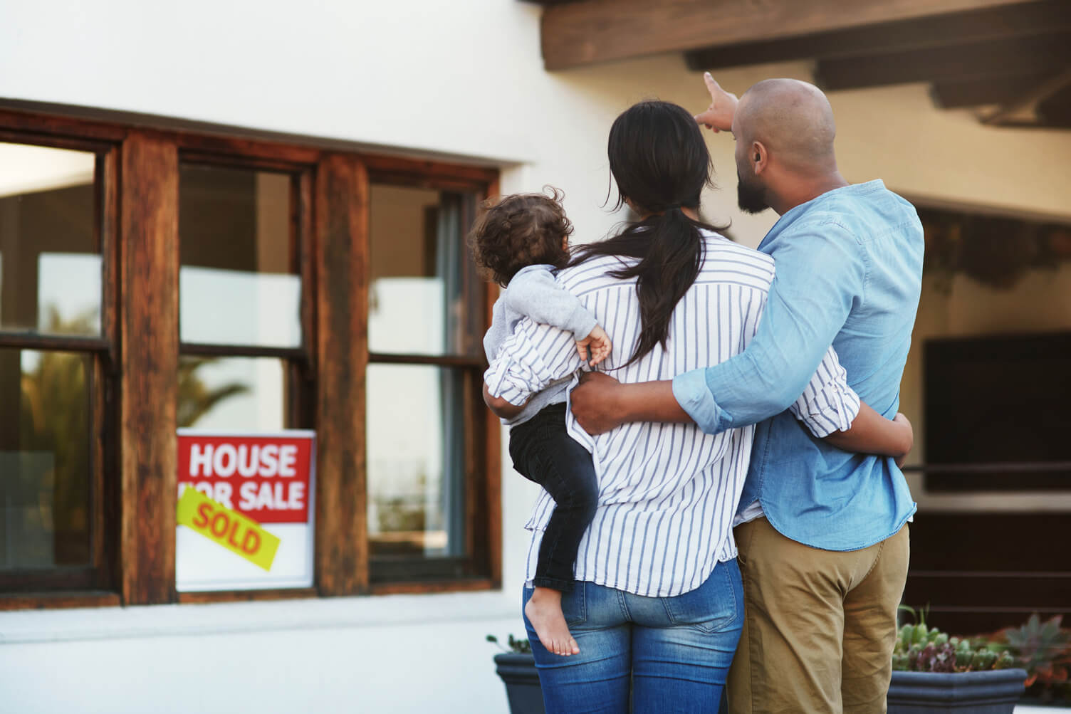 family looking at a house for sale